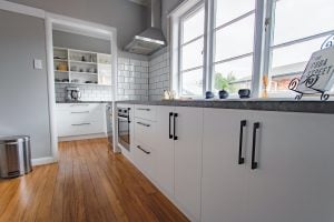 White themed Victorian inspired kitchen of a luxury house | Luxury Homes by Brittany Corporation