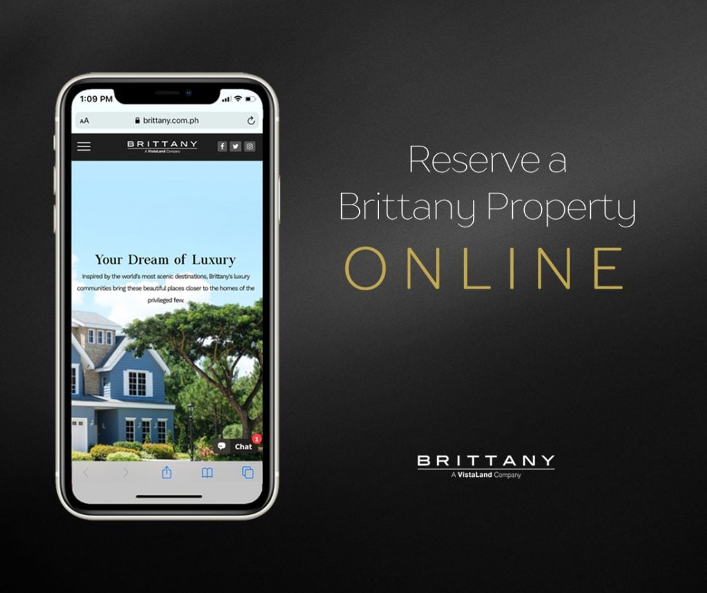 Iphone with eliot luxury smart home on the scree n with black background that says reserve a brittany property online | luxury homes by brittany corporation