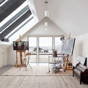 A sleek modern attic converted into an art studio | Luxury Homes by Brittany Corporation