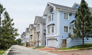 The perfectly symmetrical row of San Franciscan-inspired houses at La Posada in Lakefront Sucat | Brittany Corporation