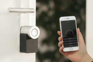 smart home device application showing doors to lock | Luxury Homes by Brittany Corporation