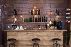 Coffee shop bar counter with wine bottles, Modern design, and Vintage atmosphere | Luxury Homes by Brittany Corporation