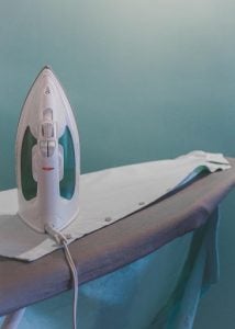 Iron and ironing board are some essential laundry equipment for your mansion in the Philippines by Brittany Corporation