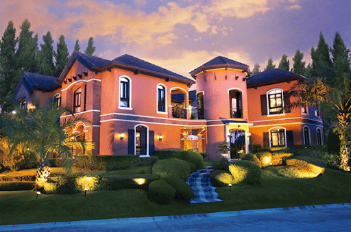 Italian mansion that’s well lit during sunset | Luxury Homes by Brittany Corporation