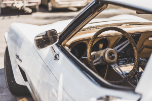 The side mirror a white vintage car on the way to a luxury home in Sta. Rosa | Brittany Corporation