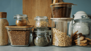 Various glass jars filled with dry goods like herbs and spices in the pantry of a luxury home for sale in the Philippines | Brittany Corporation