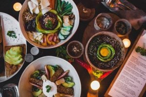 Avocado poke bowls on top of table in luxury homes with other food items | Luxury Homes by Brittany Corporation