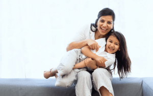 Happy family of indian mother and daughter in a clean home | luxury lifestyle and homes by brittany corporation