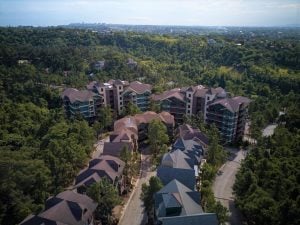 Top view of Swiss landscape with buildings and lot only properties | luxury homes by brittany corporation