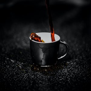 A perfect cup of coffee in a cold rainy day in a luxury home | Luxury Homes by Brittany Corporation 