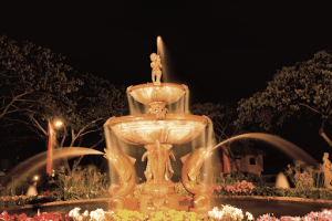 Water fountain in the night | luxury properties by Brittany corporation