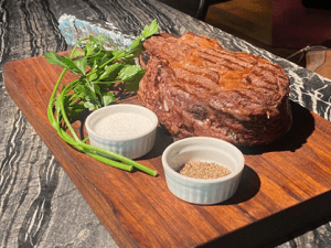 Elberts Tomahawk Steak | Luxury Homes by Brittany Corporation