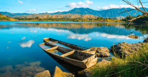 Parked boat in Lake Pantabangan in Nueva Ecija with sunset views - Brittany Corporation