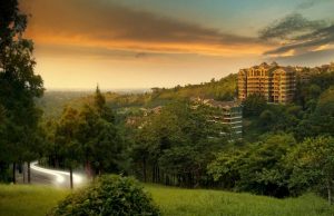 A wide-shot photo of lots for sale in Lausanne, accompanied by a sunset backdrop. | luxury homes by brittany corporation