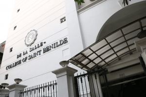 College of Saint Benilde facade white manila near vito cruz with plexiglass awning | Luxury homes by brittany corporation