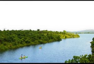 2 kayaks in the lake of lake resort luxury homes vacation | Luxury Homes by Brittany Corporation