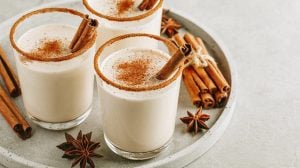 3 cups of eggnog dusted with cinnamon and star anise in a luxury home | Luxury Homes by Brittany Corporation