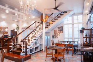 aurora restaurant in laguna old house turned restaurant with wooden everything | luxury homes by brittany corporation