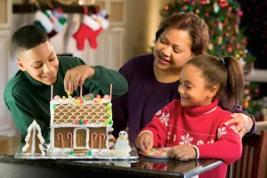 family making gingerbread house in their luxury house in Portofino alabang | Luxury Homes by Brittany Corporation