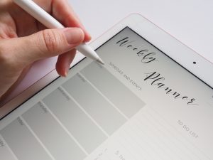 ipad weekly planner luxury real estate broker white apple pen | Luxury homes by brittany corporation