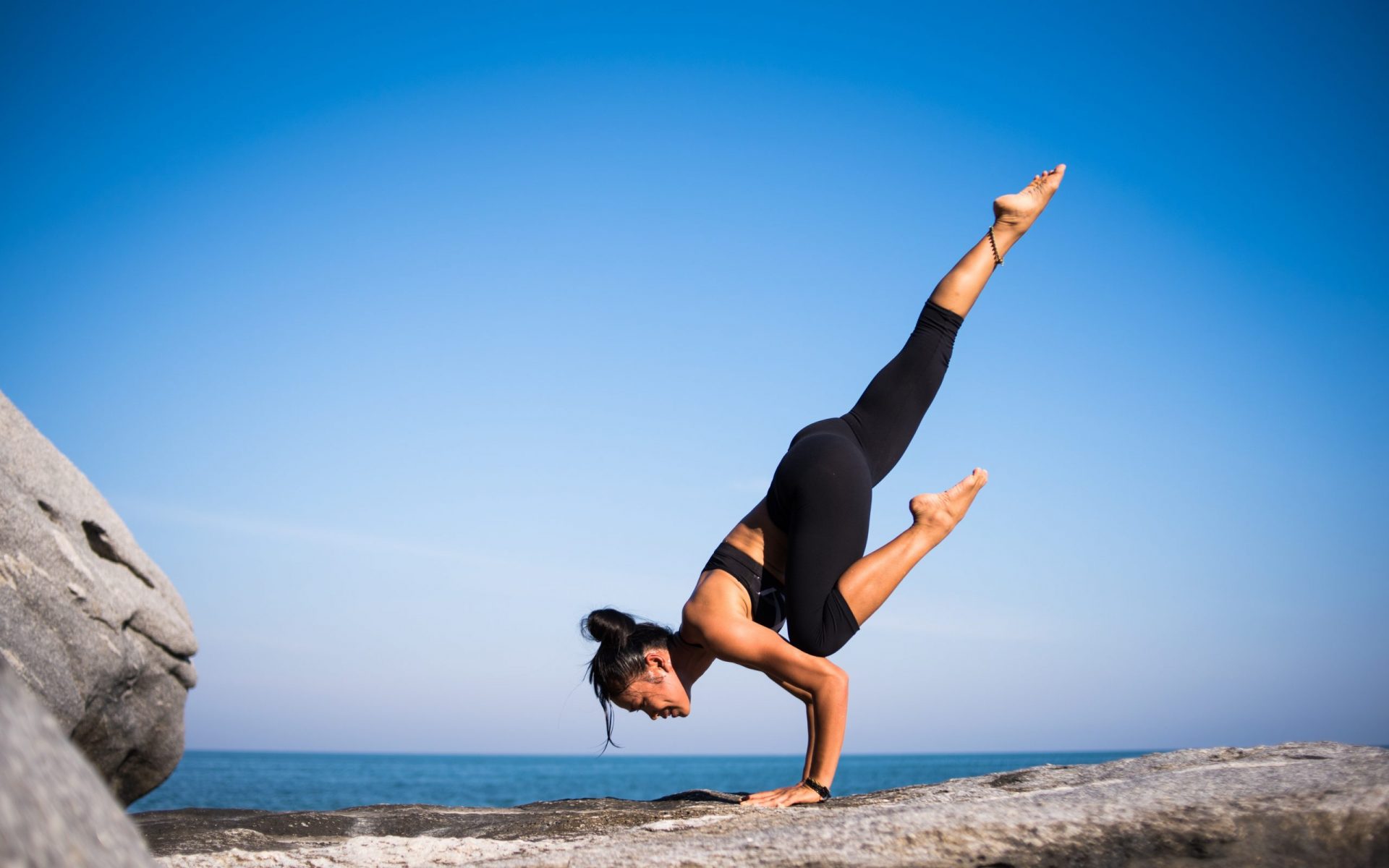 Sporty Woman Stretches At Yoga Pose During Training Workout Outdoor Stock  Photo - Download Image Now - iStock