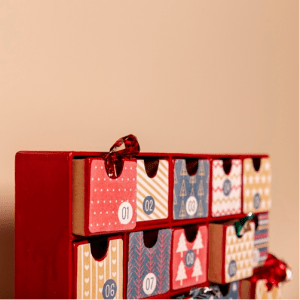 secret santa boxes in peach room | Luxury Homes by Brittany Corporation