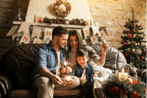 white family of three taking selfie in a christmas decked luxury house and lot in vista alabang | Luxury Homes by Brittany Corporation