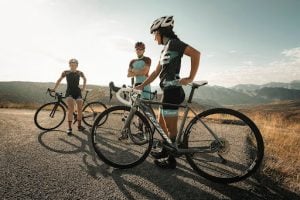 a group of friends with their bikes taking a break by daang hari | luxury homes by brittany corporation