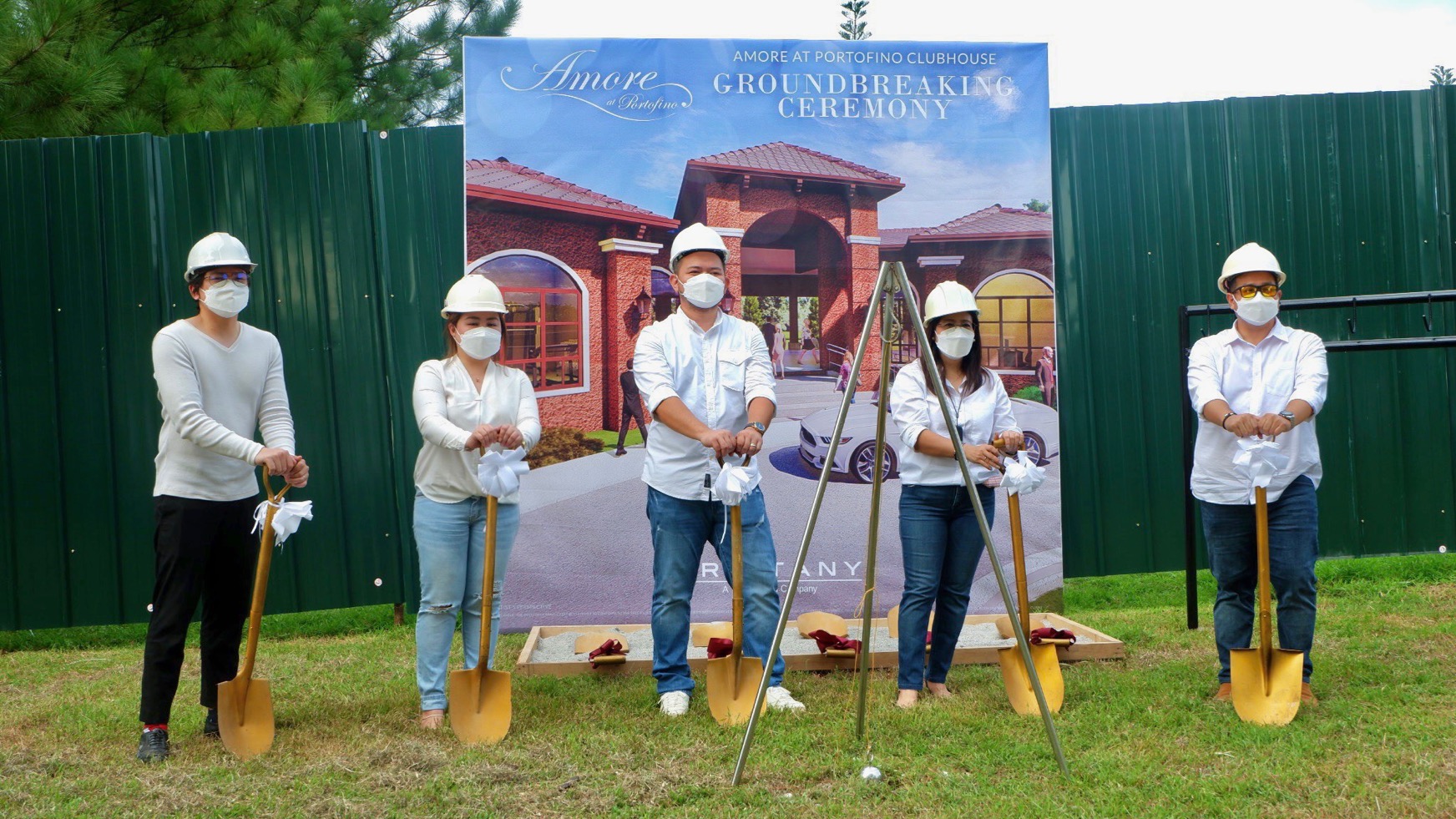 architects and engineers holding a shovel and wearing a white hard hat | luxury homes by brittany corporation