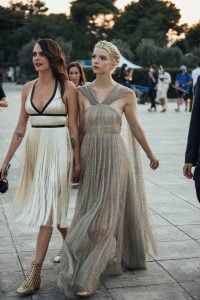 cara delevign and anya taylor joy in dior dresses walking hand in hand | luxury homes by brittany corporation