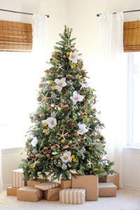 christmas tree designed to have flowewers blooming around | luxury homes by brittany corporation