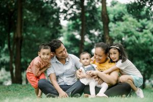 filipino family enjoying a day out in the park | luxury homes by brittany corporation
