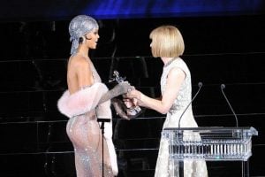 rihanna accepting an award from anna wintour | luxury homes by brittany corporation