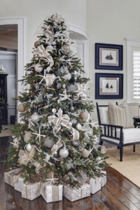 starfish inspired christmas tree with silver gifts under | luxury homes by brittany corporation