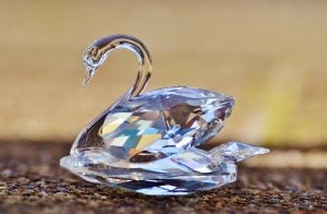 swarovski crystal turned into their logo swan | luxury homes by brittany corporation