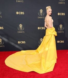 yellow dior trail backless dress with pockets on anya in the emmys | luxury homes by brittany corporation
