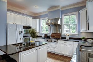 Large American style kitchen interior with granite countertops | luxury homes by brittany corporation