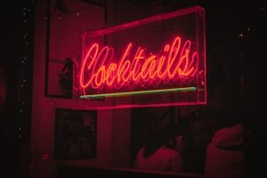 neon lights that spell our cocktail bar | luxury homes by brittany corporation