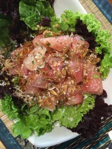 pomelo fresh salad on plate | luxury homes by brittany corporation