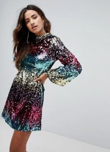 woman in a sparkly colorful dress | luxury homes by brittany corporation