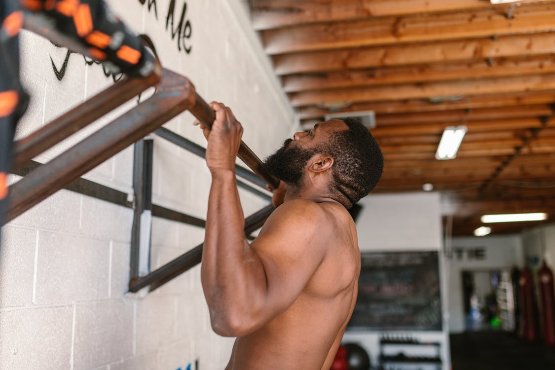 Pull-up are a great way to strenghten your upper body, back, and core. Photo from Pexels.