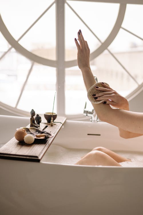 Soaking in a warm bath is a great way to end the week. Photo from Pexels.