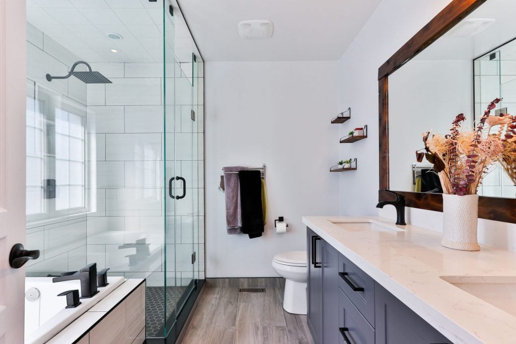 white ceramic sink near white ceramic sink - Transform Your Bathroom into a Relaxing Oasis