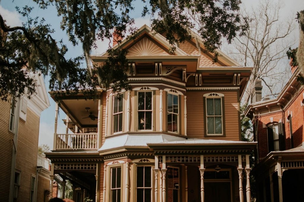 An old beige two-story house