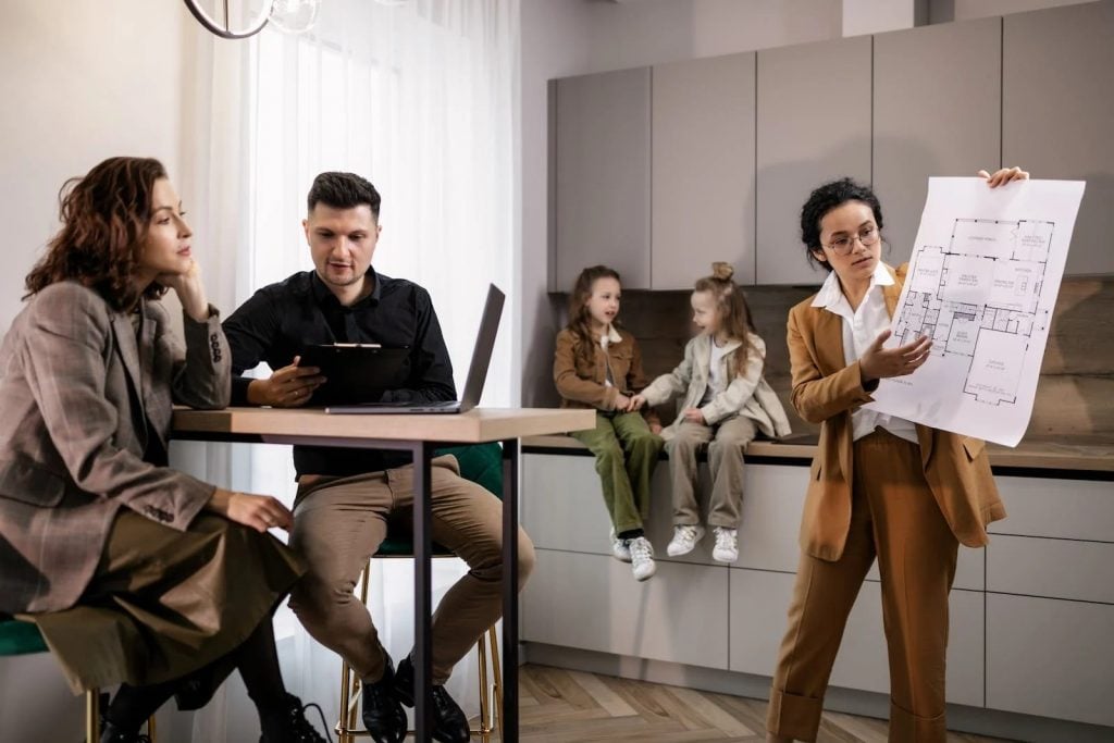 Family checking the details of the property