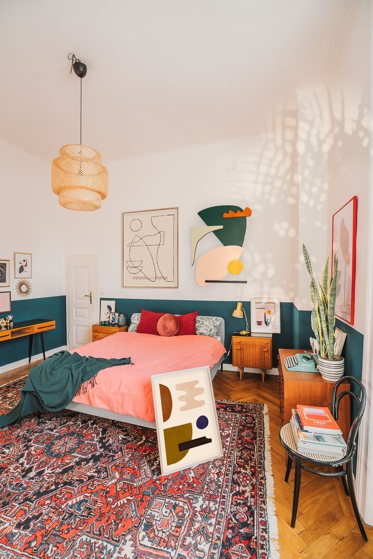 An artsy bedroom with doodle paintings on the wall