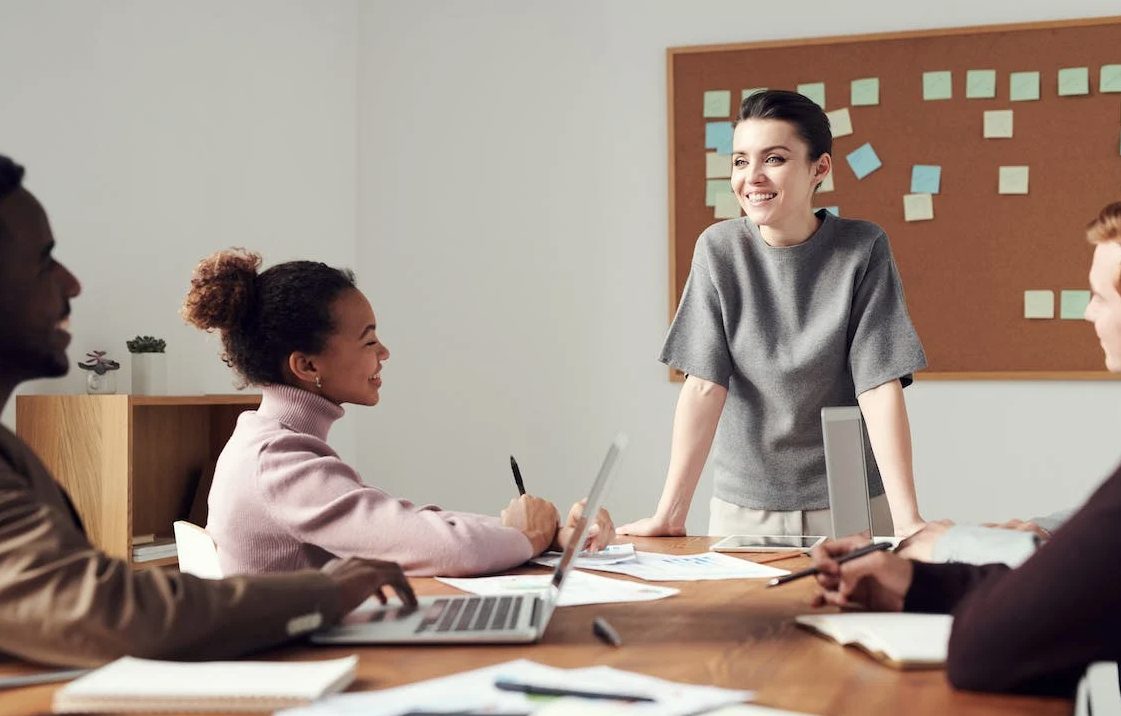 Photo of a woman teaching her students