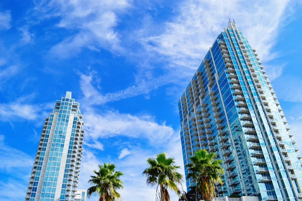 Photo of tall buildings and blue sky