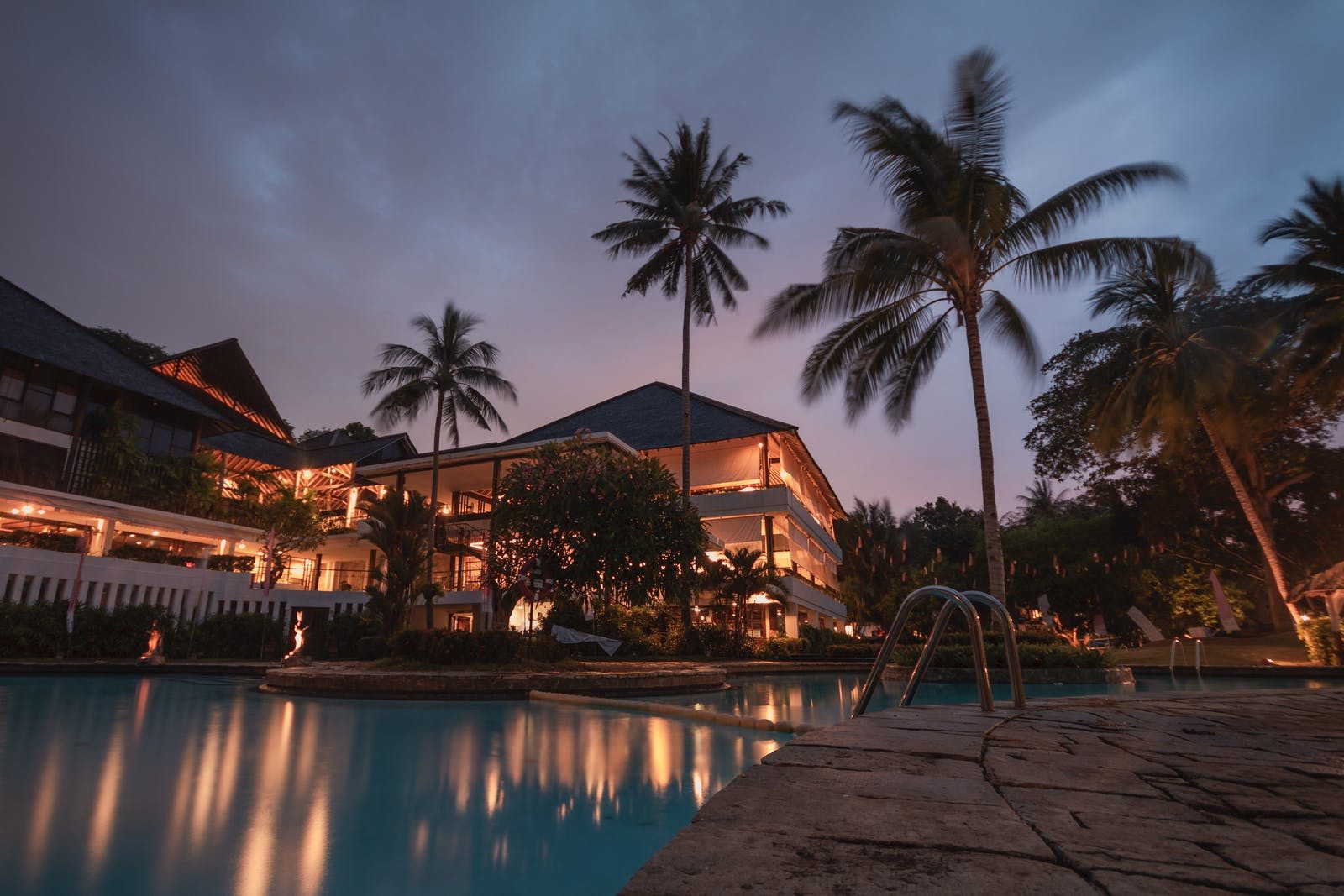 Photo of a resort pool at dawn