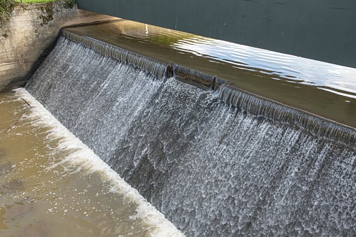 Weir in a small dam / sluice - water reservoir engineering feature